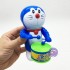 Đồ chơi Doraemon đánh trống vặn cót bằng nhựa